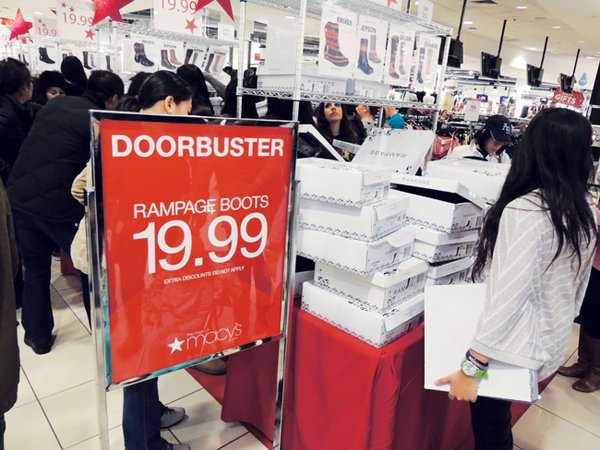 BLACK FRIDAY: Like many retailers, Macy’s opted to open on Thanksgiving night this year, giving consumers a head start on Black Friday shopping. The early opening was a success. The Macy’s location at South Coast Plaza in Costa Mesa, Calif., was packed with shoppers looking for a deal.
