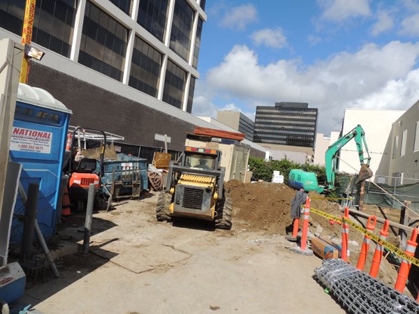 BEFORE THE GLITTER: Construction crews work on the space of what will become the Burberry building on the corner of Rodeo Drive and Dayton Way. 