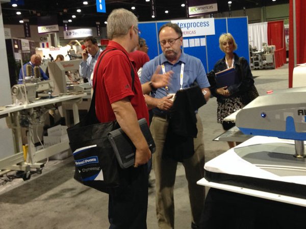 Southeast Sewing’s Jeff Miller demonstrates screen-printing using a Brother garment printer.