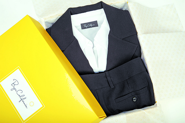 BOXED UP: Byer California has a deal for young contemporary women on a budget looking to spiff up their professional wardrobe. For $98, they can get this box, filled with one pair of black pants, a matching black jacket, a black skirt, and a pink or white blouse.