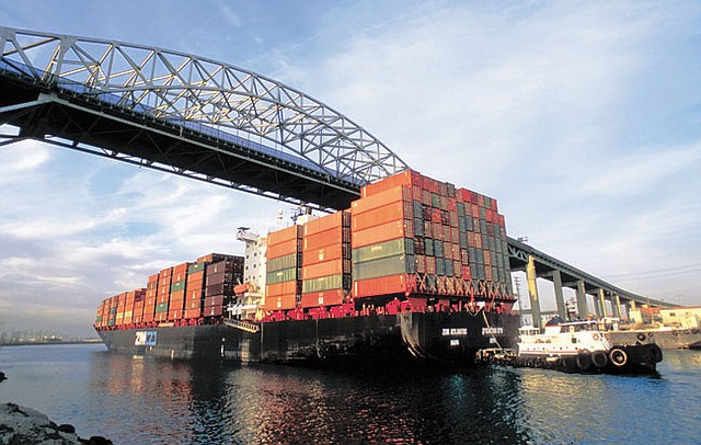 CLEAR CRUISING: A cargo-container ship piled with imports sails into the Port of Long Beach.