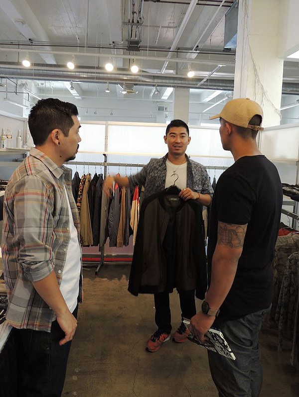 VENUE: Wolf & Man’s Jared Ito and Brian Chan with Joseph Ortega, right, at the Venue show in July
