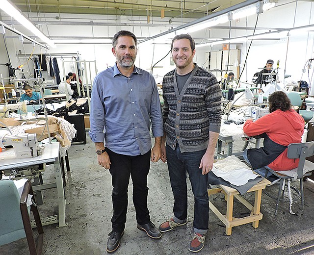 Brian Weitman and Jack Ribakoff in the sewing room at Security Sourcing International Apparel.