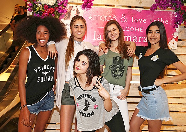 Models show off the Love Tribe line. In center, brand ambassador Laura Marano. Image courtesy Love Tribe.