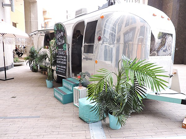 STREAMLINE: Pura Vida rolled out a creative marketing tool in this Airstream trailer, which housed a wide selection of handmade bracelets and earrings. It sat in the front patio of the California Market Center during Los Angeles Fashion Market. | Photo by Deborah Belgum