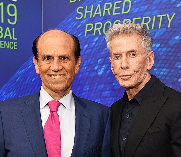 Michael Milken and Calvin Klein