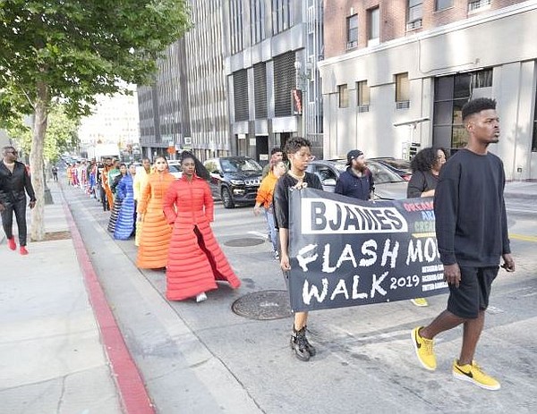 Brandon D James led a Flash Mob Walk through downtown Los Angeles on June 7.