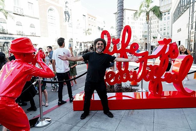 Mr. Brainwash unveils statue on Rodeo Drive on Aug. 1. Photo by Lex and Tim for @scottclarkphoto