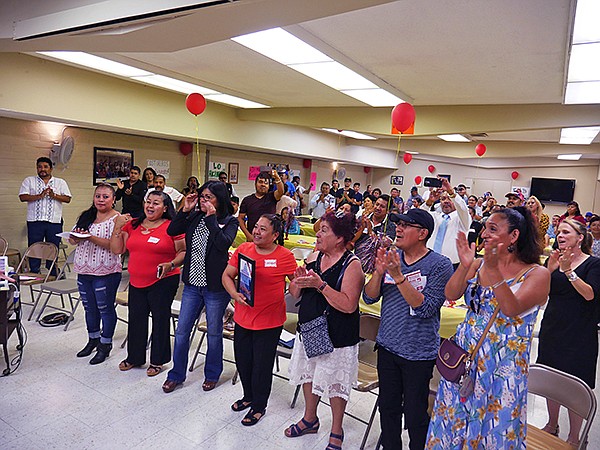 Garment workers celebrating.