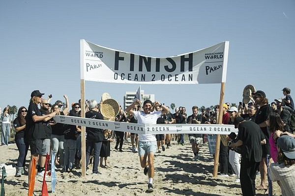 Sam Bencheghib at finish line of Ocean2Ocean run. Photo by Jacqueline Verdugo