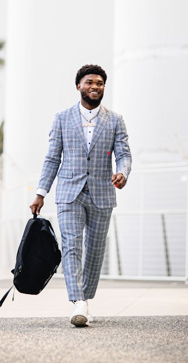 Cam Akers in a Knot Standard custom suit. Image courtesy Knot Standard