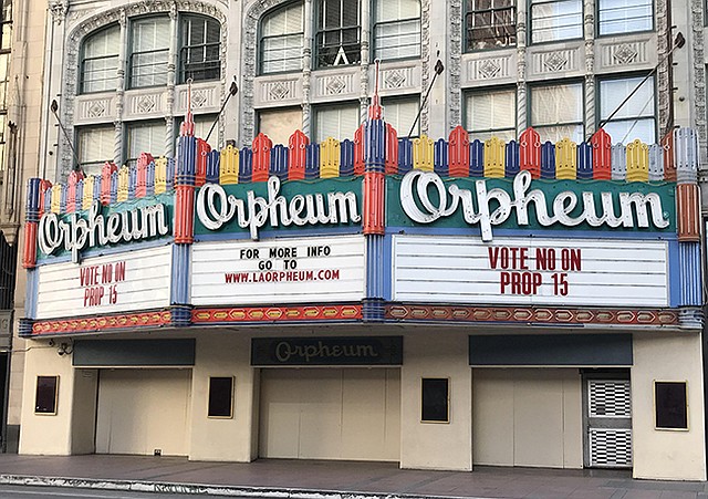 An anti–Prop. 15 message on DTLA’s shuttered Orpheum Theatre regarding the hotly debated commercial-property-tax bill.