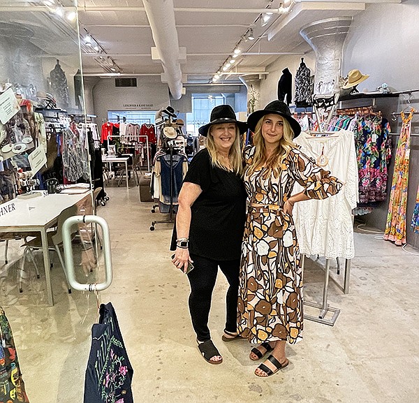Lisa Lenchner (left) and Shannon Kane pose in front of their women-led showroom Lenchner & Kane Sales.