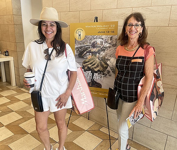 Owner of the Legacy boutique Milena Hernandez, left, and buyer Annie Williams browsed The New Mart.