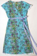 THIRD FLOOR DESIGNS' blue garden-print cotton "Marina" long wrap robe ($50) with eyelet trim and gingham tie