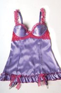SHIRLEY of HOLLYWOOD\'S polyester charmeuse and chiffon ruffled-lace baby doll ($22.75) in lilac and pink