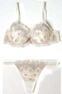 MYLA's tulle embroidered "Puss in Boots" padded bra ($87) and thong ($48) in ivory and mist