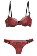 WHITE LAUNDRYs polyester/nylon/elastane Boudoir plunge bra and thong in pink/red/black (call for pricing).