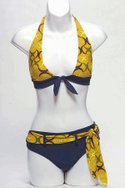 GYPSY GIRL SWIMs yellow Italian nylon/Lycra Chain Link scarf-tie halter ($14) and belted boy-leg bottom ($15).