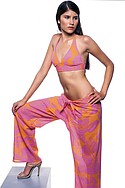 SPEEDOs nylon/Lycra Hibiscus two-piece halter and scoop bikini bottom ($35) and cotton gauze Hibiscus pull-on, tie-front pant ($30). Endless 4-inch gold hoops ($1.50) by BALLET.