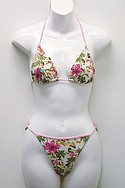 PRINCESS TAM.TAMs Meryl/Lycra/polyamide Monoi triangle set in ivory with pink gingham straps ($56).