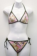 GUESS? SWIMWEARs pink polyester/spandex vintage-Hawaiian soft-cup triangle bra ($20) and side-tie pant ($17).