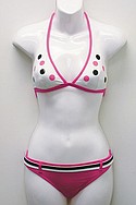 RAMPAGE SWIMs white-and-pink Tactel/Lycra Big Dot halter with binding ($42) and pink Block Party belted hipster ($38).