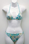 RAMPAGE SWIMs aqua Tactel/Lycra Glamour Girl Swirl soft-cup triangle top ($38) and side-ring hipster ($38).