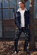 LEVI'S RED TAB's rinsed indigo-denim  fleece sherpa jacket (call for pricing), KUNNA's white "Emma Wood" long-sleeve tee ($78), KZO and UNHOLY MATRIMONY's wool/cotton plaid "Untitled" pant ($183). GORDON RUSH's black vintage leather boots ($170).