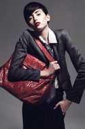 GEORGIE's "Sofi" menswear-sheen shrunken boyfriend blazer ($149). EVER's cotton stripe button-down "Estoncia" shirt ($70). ROBERT RODRIGUEZ's high-waisted tuxedo pant (call for pricing). MATT & NAT's Japanese paper "Jorja Lg" handbag ($118). VICTOR OSBORNE's black "Trilby" Panama straw hat ($115).