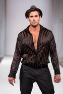 Paulie Gibson presents his designs on the runway at Vibiana, Style Fashion Week downtown Los Angeles during LA Fashion Week March 12, 2013
