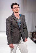 Paulie Gibson presents his designs on the runway at Vibiana, Style Fashion Week downtown Los Angeles during LA Fashion Week March 12, 2013