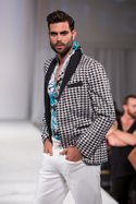 Paulie Gibson presents his designs on the runway at Vibiana, Style Fashion Week downtown Los Angeles during LA Fashion Week March 12, 2013