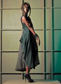 Suzanna Khachatryan’s draped evergreen gabardine dress with raw silk dupioni cocoon coat. 