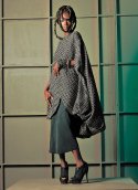 Suzanna Khachatryan’s draped evergreen gabardine dress with raw silk dupioni cocoon coat. 