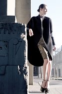 CERRE “Galiana” structured, felted wool coat ($330). KILL CITY “No Chaos, No Creation” cotton.and vegan-leather shirt ($50). ROBERT RODRIGUEZ COLLECTION “Pixel Print Techno Skirt”.($125). STEVE MADDEN “Deeny” leather platform heels (call for pricing).