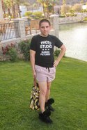 LA socialite Evi wearing Jeremy Scott shoes/bag, Miu Miu shorts and a Marc Jacobs shirt.
