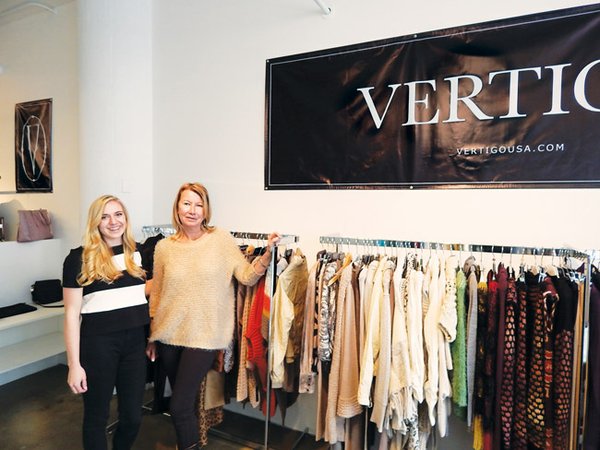 NEW SHOWROOM: Katelyn Hill, sales assistant, and Marion Metcalf, sales representative, work in the Vertigo showroom.