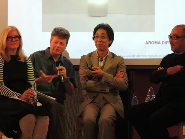 From left, Brooke Hodge, of Hammer Museum, a translator, Masaaki Kanai of Muji and Hitoshi Abe, chair of UCLA's department of architecture and urban design.