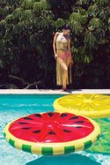 LULI FAMA SWIMWEAR “Mermaid Glitter” intertwine scoop halter top. OAKLEY “Boundless” strappy bottom. COCO JOHNSEN “Streva” string coverup. Photography by Sophia Alvarado.


