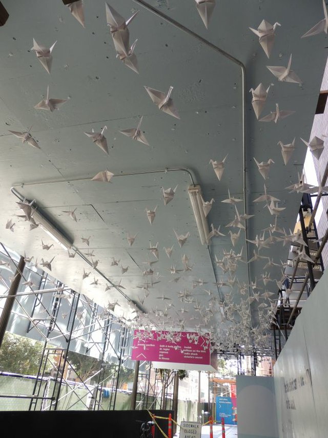 A flock of origami birds flies at The Bloc in downtown Los Angeles.