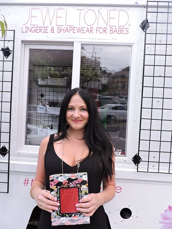 Rachael McCrary of Jewel Toned in front of the brand's mobile shop.