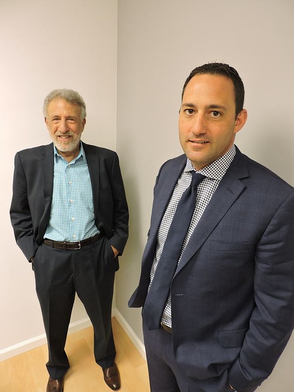 George Zimmer, center and Scott Silverstein at California Apparel News offices on June 2.