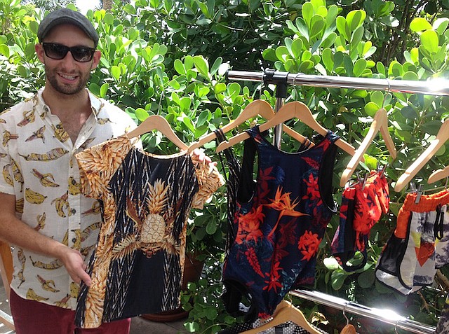 Jeremy Somers of We Are Handsome shows off the brand's latest at a brunch for editors at Miami Swim Week