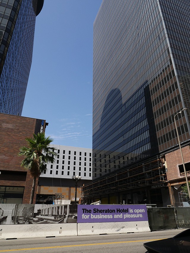 Street level picture of The Bloc. The under construction retail center had its roof removed in June.