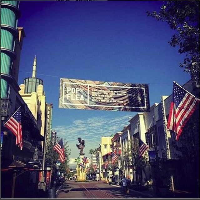 Banner at The Grove advertising Pop Up Flea. Image via Pop Up Flea's Instagram pop-up-flea.