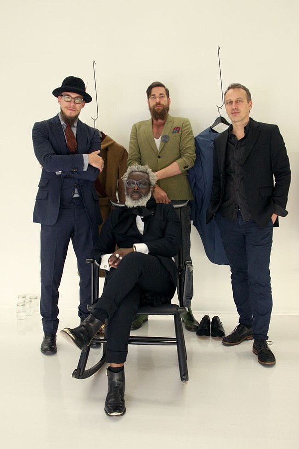 HERE COMES NORWEGIAN RAIN: T-Michael, a designer of Norwegian Rain and his self named line, T-Michael, seated. Standing from left, Alexander Helle, Norwegian Rain creative director, Wesley Swolfs also of Norwegian Rain and Eric Beugnet of Modern Tribute. Photo by Landra Dulin/LAFW