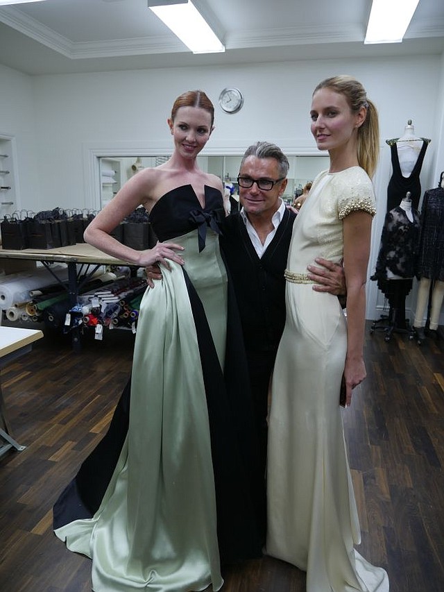 Mark Zunino and two models wearing his gowns. Picture taken in his new atelier's workroom.
