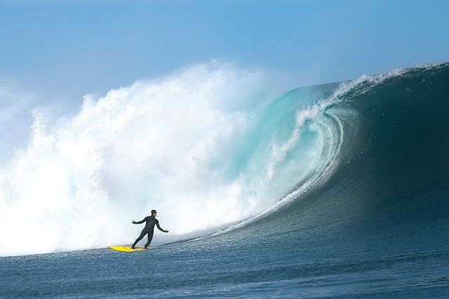 Surfing in a Patagonia neoprene-free suit. Image courtesy Patagonia.