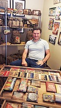 Kemal Dural, owner of United States of Art, a collection of artsy, leather and canvas vintage novelty wallets and accessories